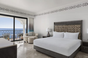 Premier Suite Bedroom with sea view from balcony