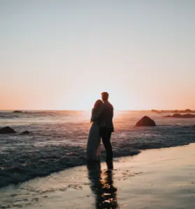 picture of bride and groom on sea beach