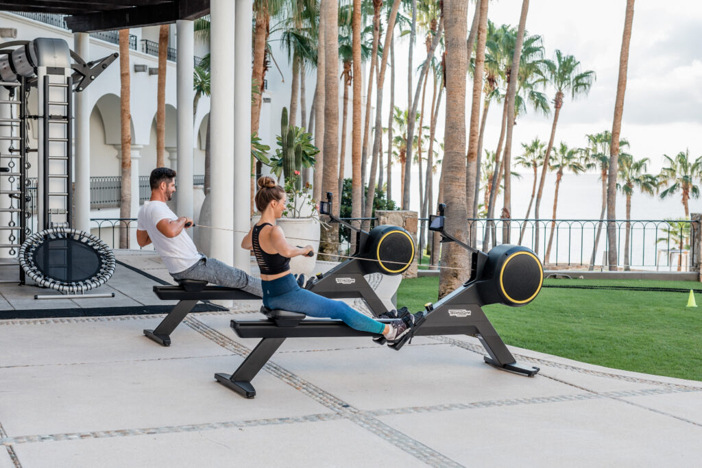 picture of two people working out in garden surround area