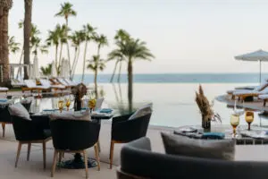 picture of sitting area near the swimming pool with a sea view