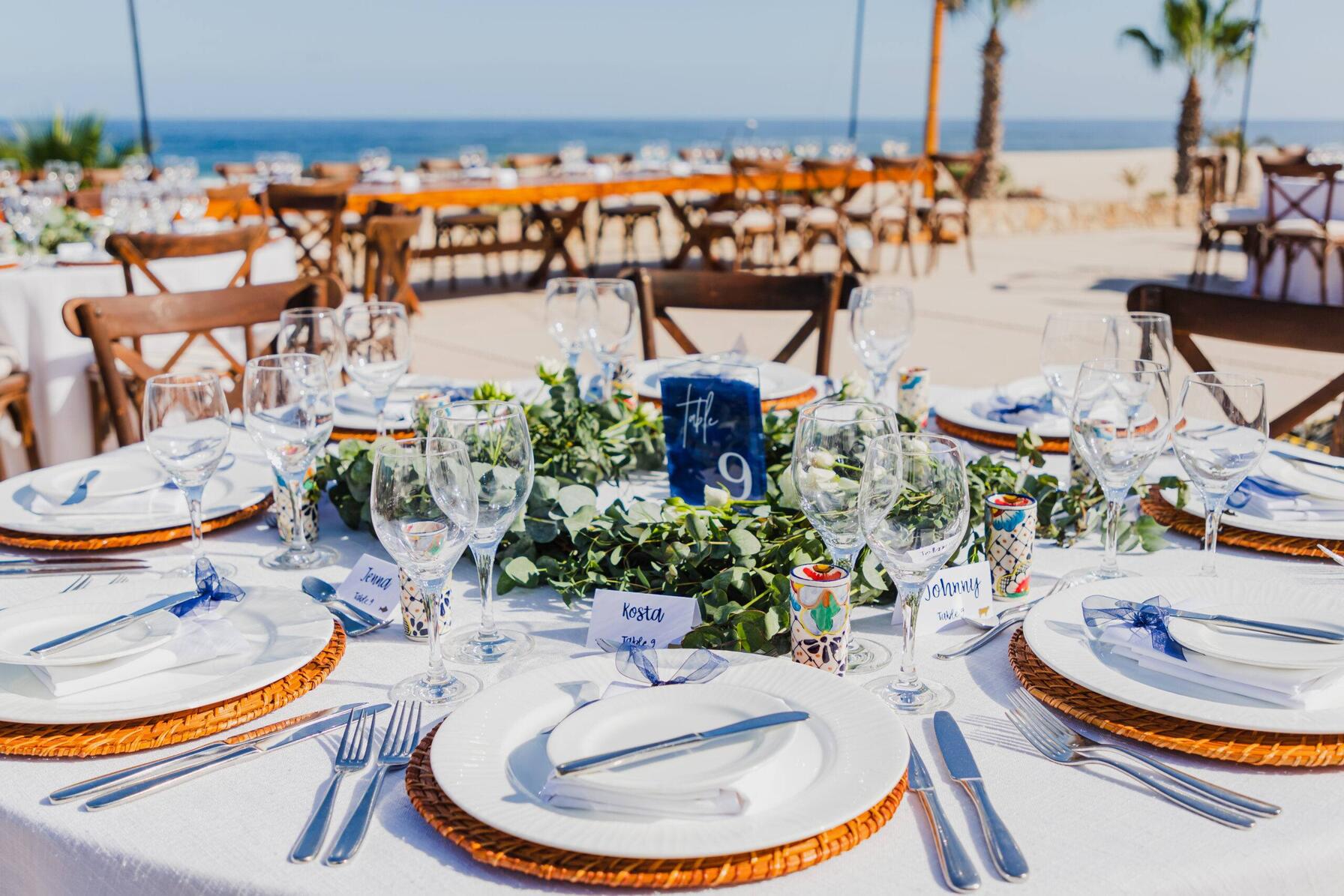 picrture of the table with dishes and the sea view
