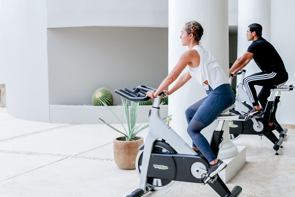 picture of two people working out in garden surrounding area