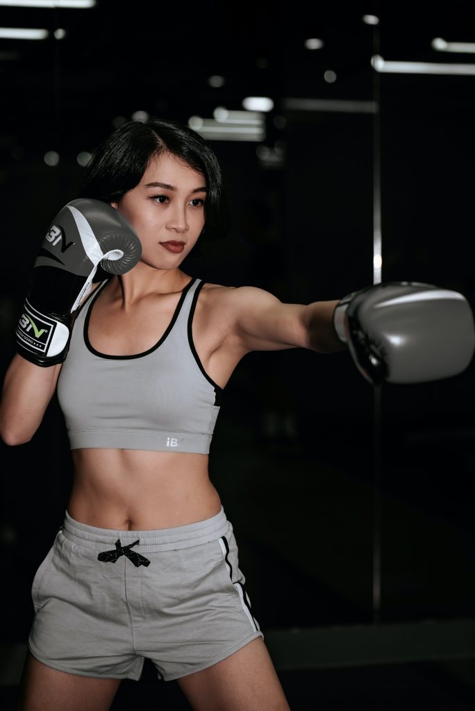 Picture of a women with wearing boxing gloves